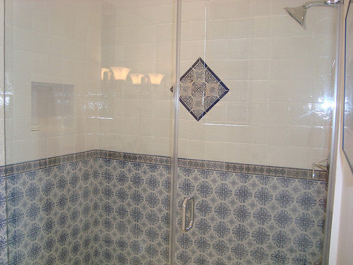 Spanish Tile are used in this as bathroom wainscot in the shower