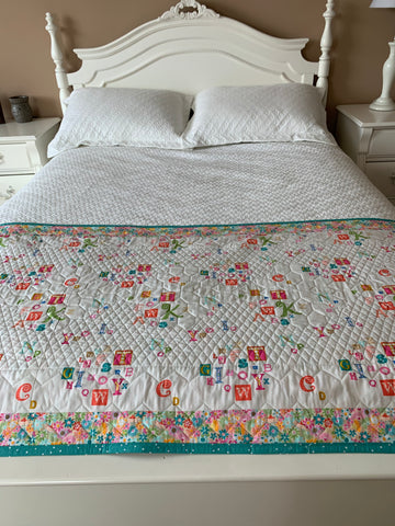Other side of the coverlet quilt