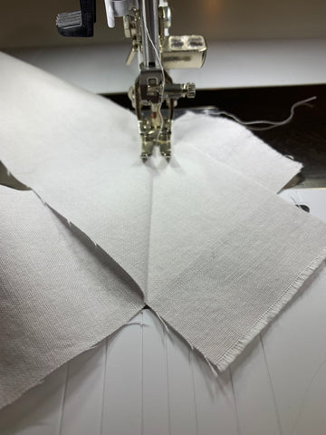 Stitching binding sections together