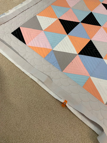 Estimate where the binding seam are so they don't fall at the corners.