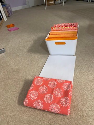 Folding fabric to fit in large Ikea container