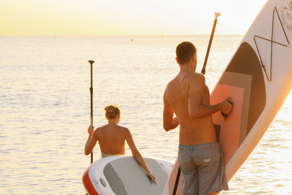 Paddle boarding at sunset