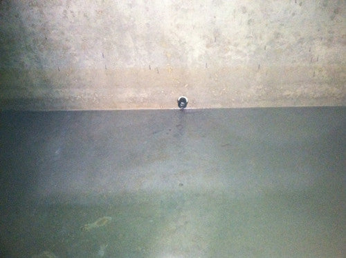 Cleaned concrete cistern.