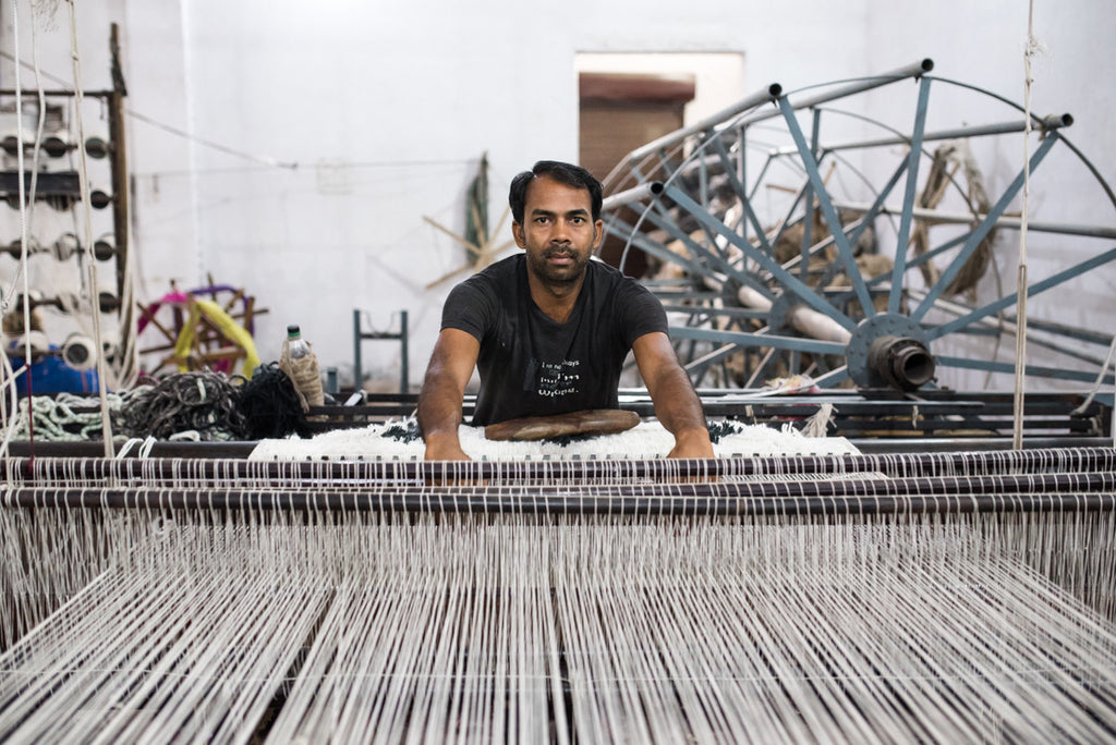 indian weaver on the loom