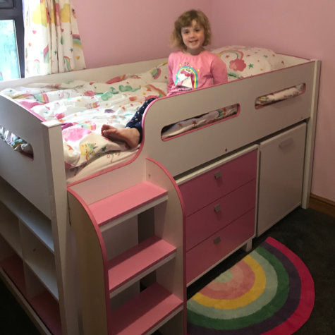 Child on Pink Kimbo Bed