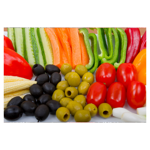 Crudities, green pepper, red pepper, carrot batons, cucumber sticks, baby corn, cherry tomatoes, green olives, black olives, spring onion