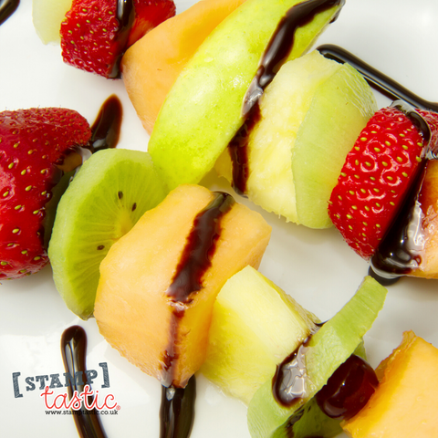 Fruit kebab with chocolate drizzle