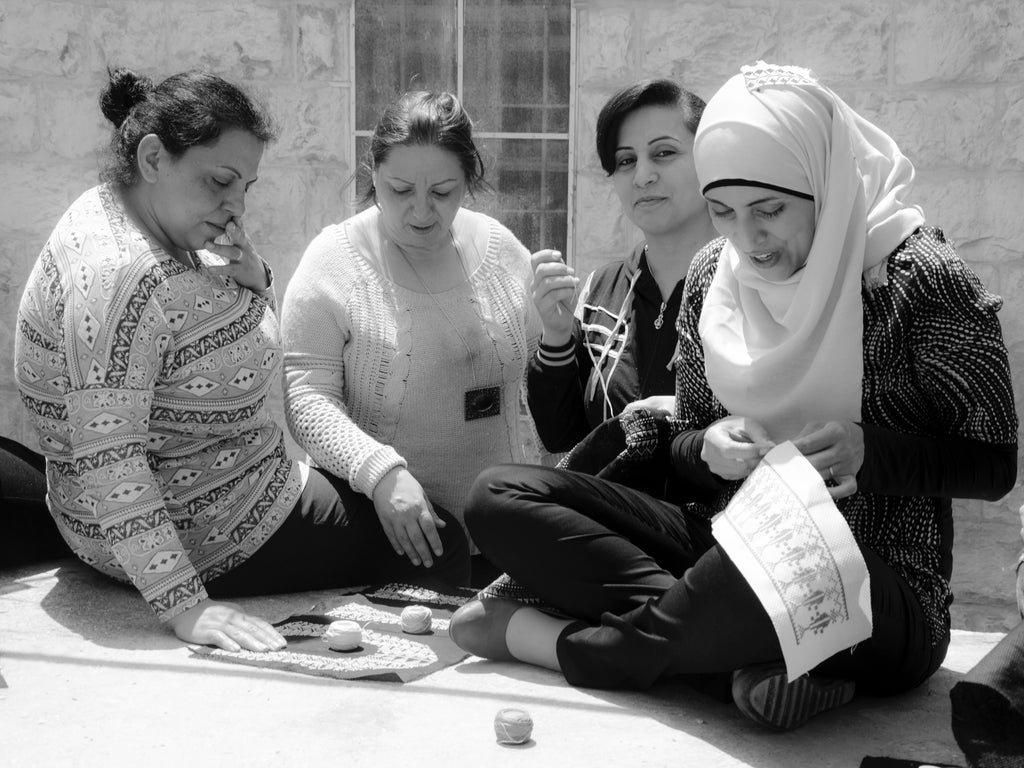 darzah women employees stitching work