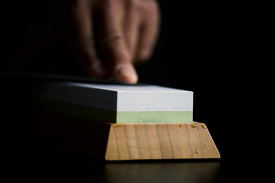 Using a whetstone on a cleaver