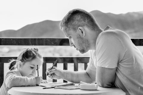 kids spending time with parents reading