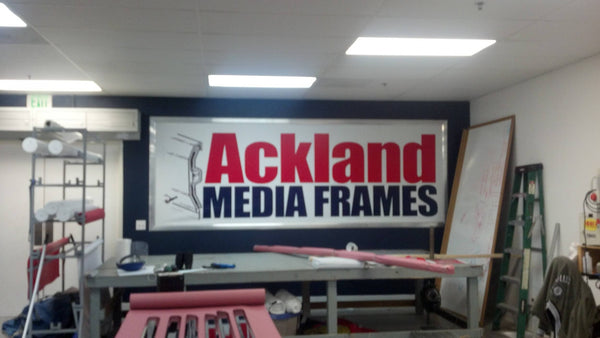 Walls displaying the Ackland Media Frame System. Free ground shipping in U.S.