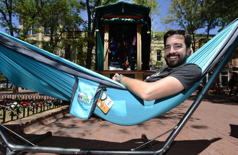 Seth Haber, owner of Trek Light Gear, is pictured at his kiosk Thursday on the Pearl Street Mall in Boulder. (Paul Aiken / Staff Photographer)