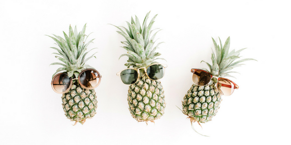 3 pineapples with sunglasses