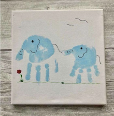 mom and child hand print made into elephant craft