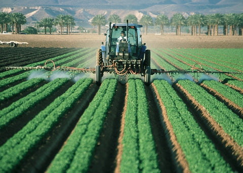 farmer tractor pesticides