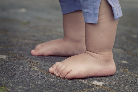 kids barefoot toes on ground