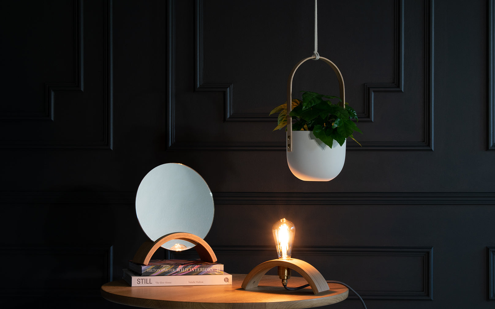 Tom Raffield Tilner Mirror, Mawnan Planter and Archer Table Light.