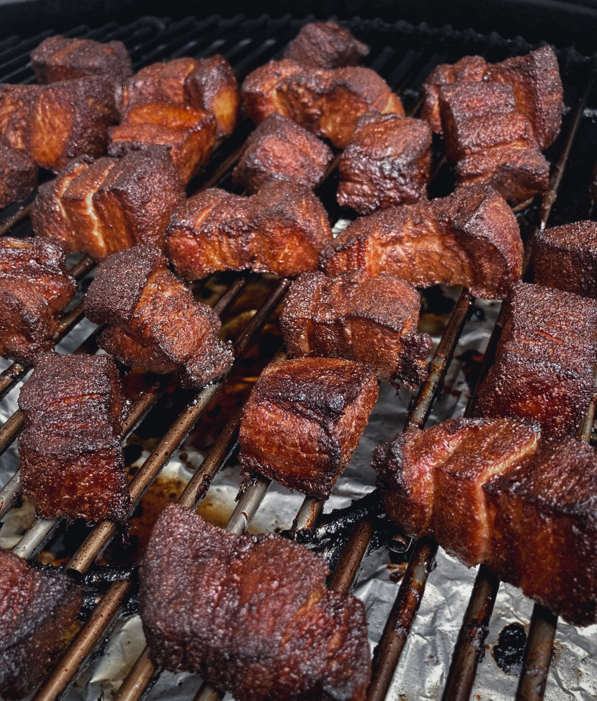 Photo of smoked pork belly burnt ends covered in bbq flavored dry rub