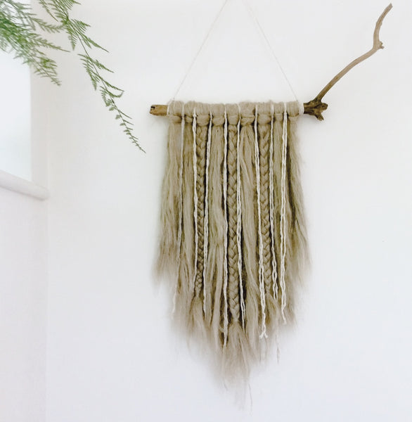 Wall hanging made from merino wool by Nest and Burrow. Love the neutral tones.