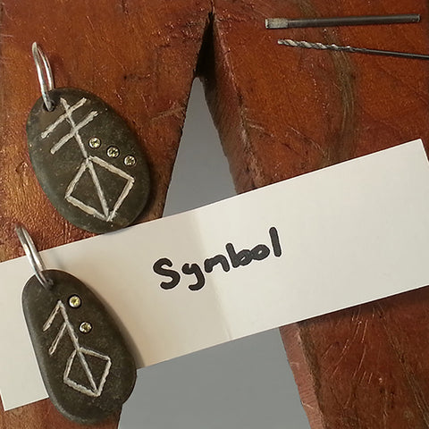 Symbolic Jewelry - Carved stone pendants with the Viking runes for Love and Creation, made for the Tinker Word Challenge