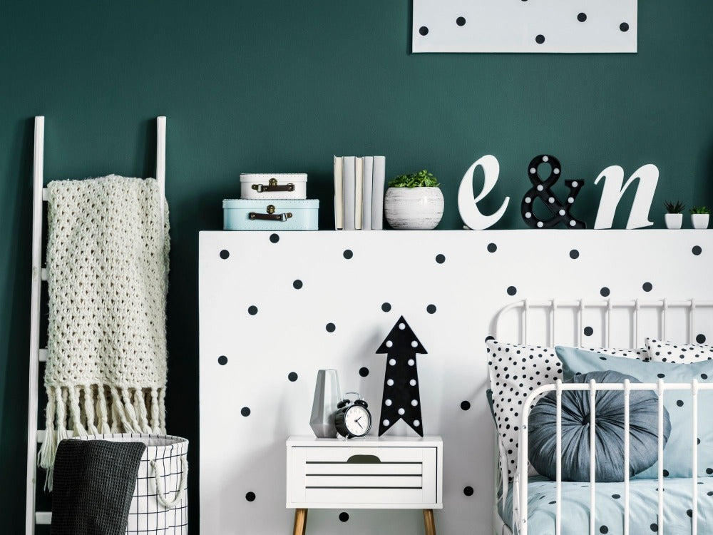 Baby's nursery with black and white bold dots