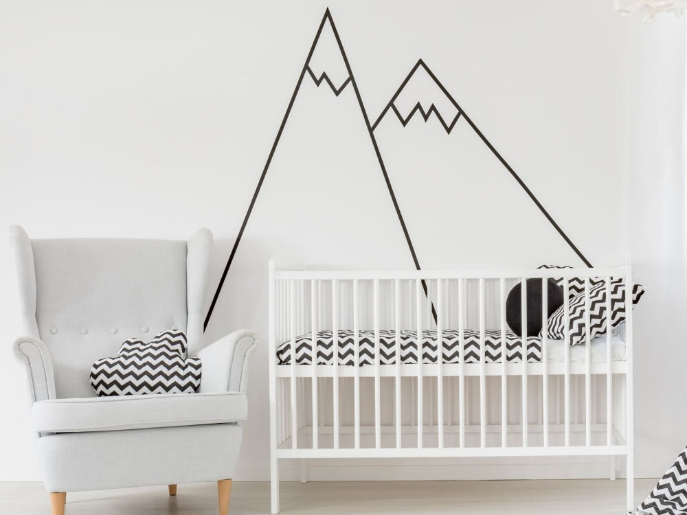 Baby's nursery with large mural