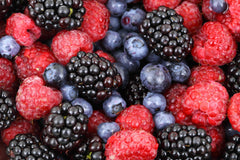 A pile of blueberries, rasberries, and blackberries | Bubu Brands