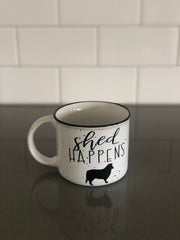 A light colored coffee mug that has a picture of a dog and says shed happens | Bubu Brands 