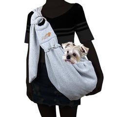 A light dog in a sling on the back of a human wearing dark clothing | Bubu Brands 