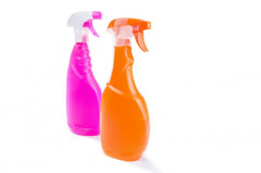 Two bright colored spray bottles for cleaning | Bubu Brands 
