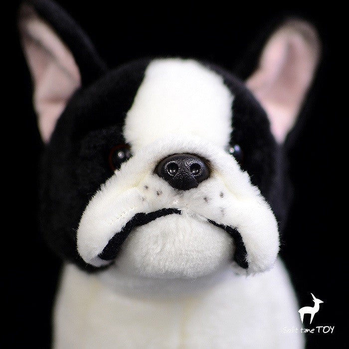 black and white stuffed dog