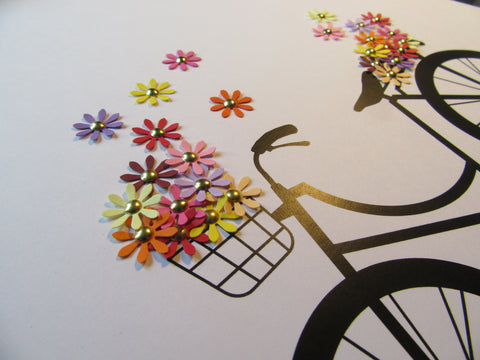 Vélo et fleurs en papier