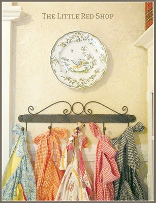 Vintage Aprons in Kitchen by The Little Red Shop