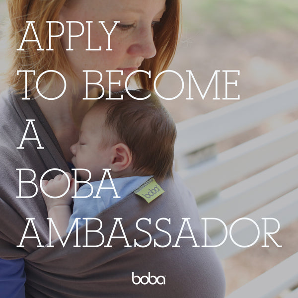 Mother wearing a baby in a boba wrap. Text overlay: Apply to become a Boba Ambassador.