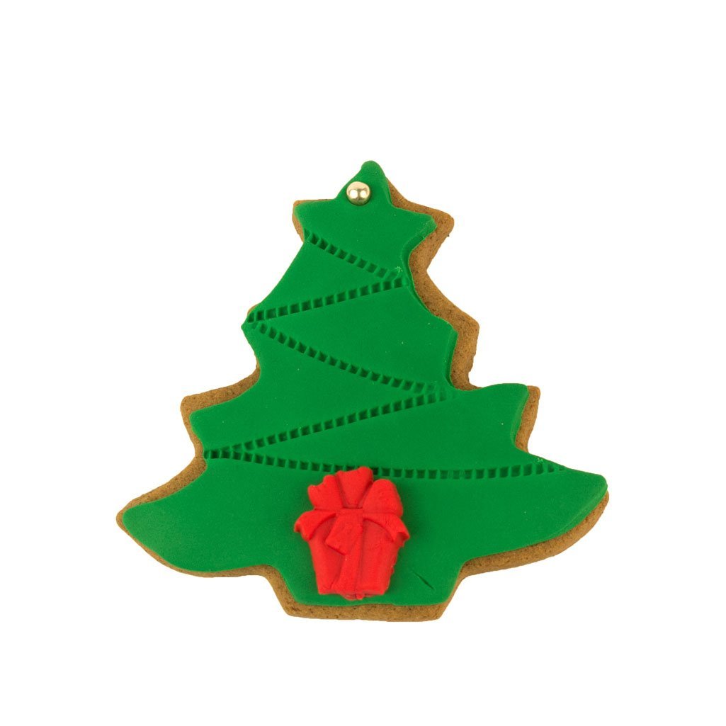 biscuit with green and red icing shaped like a christmas tree