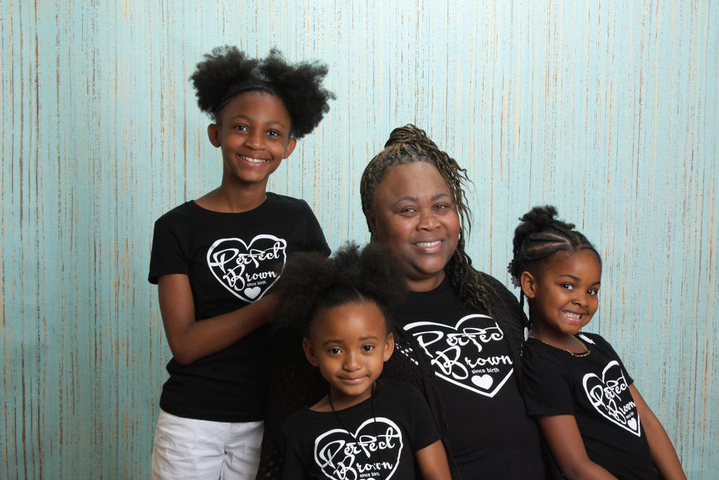 family group of african american girls with their grandmother wearing black perfect brown t-shirts family photo