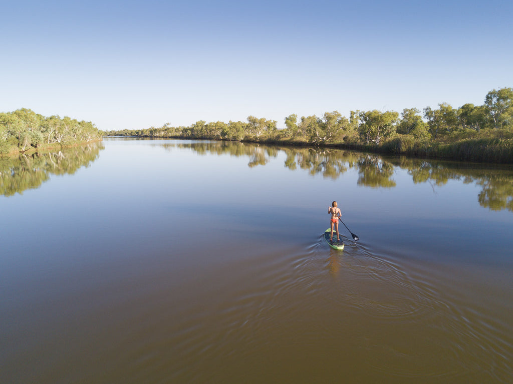 kelsie paddling up the creek