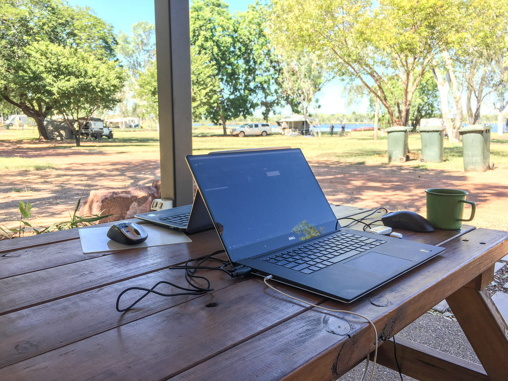 Me laptop on a bench in kununurra