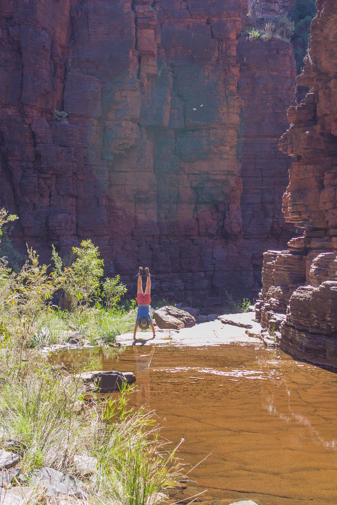 mike handstanding in a gorge