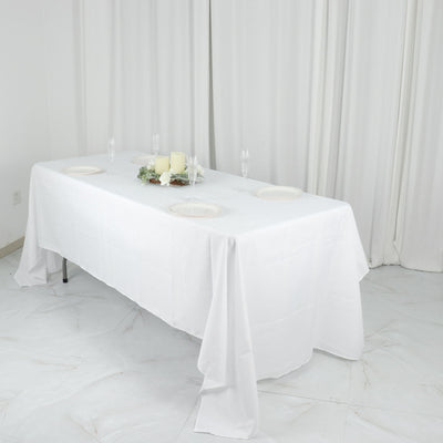 60"x126" White Polyester Rectangular Tablecloth
