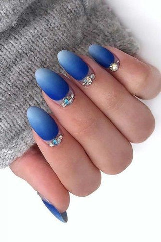 Bright blue ombre nail design