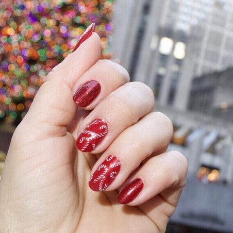 This Red Candy Cane Christmas Nail Design
