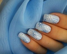 Rhinestone and snowflake Winter Nail Designs