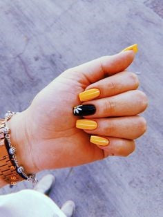 White Flower and Orange Nail Idea