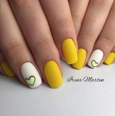 Yellow heart nail design