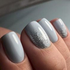 Grey nail design with some chrome powder