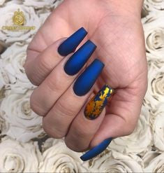 Gold sequins and dark blue nails