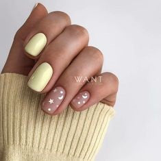 Yellow pastel nail design