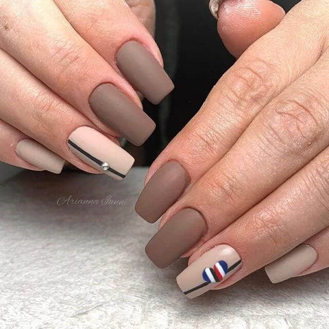 Clever Nude Nail Design with Ring Finger Accents