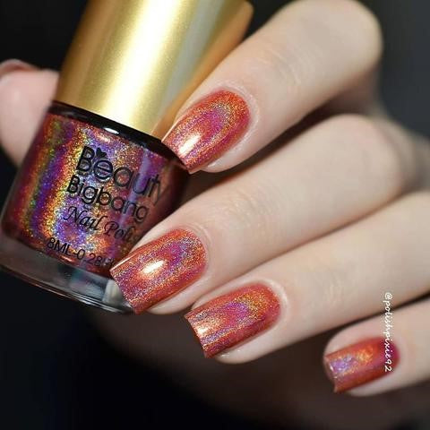 Orange holographic nails